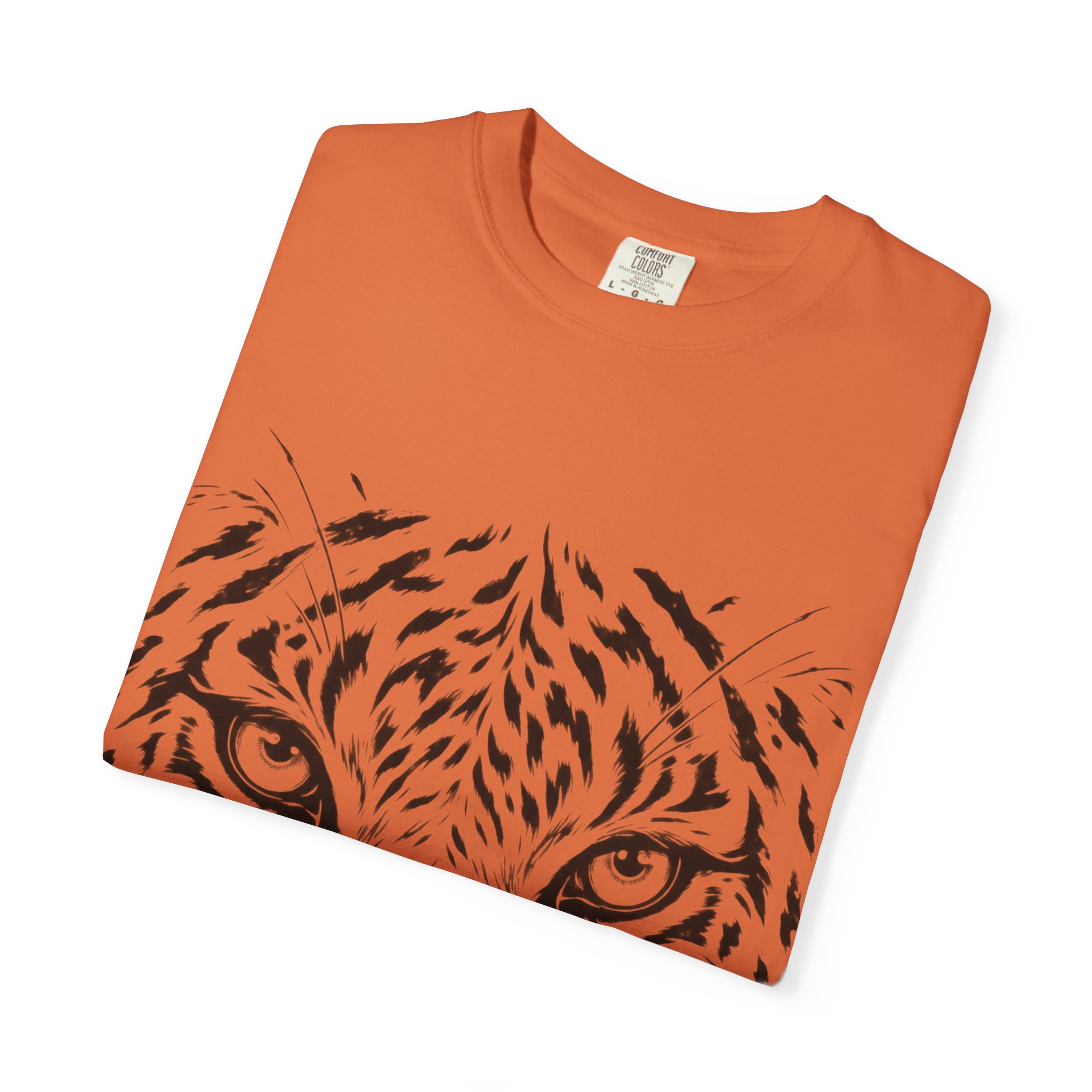 Rust-orange Tiger Face T-shirt, folded to show the front design.